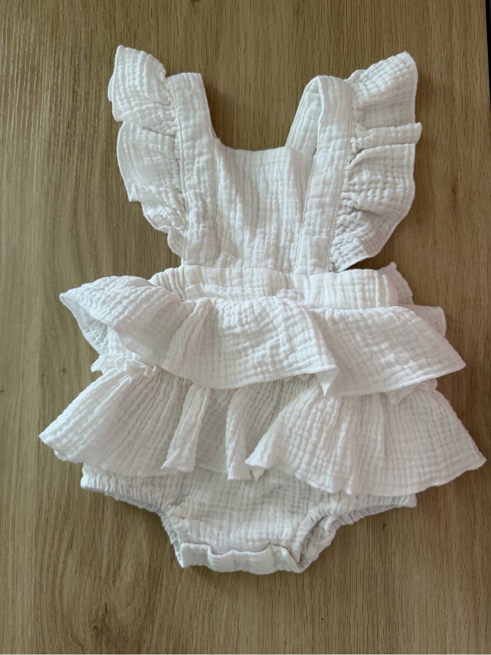 White Textured Baby Romper with Ruffle Details